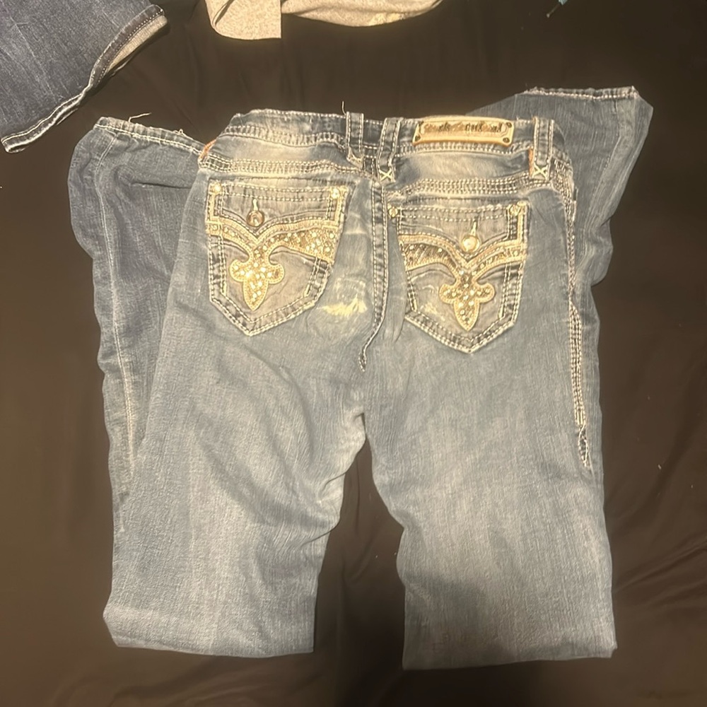 Hole in but off jeans worn